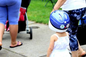 child-wearing-helmet-lids-for-kids-grand-rapids
